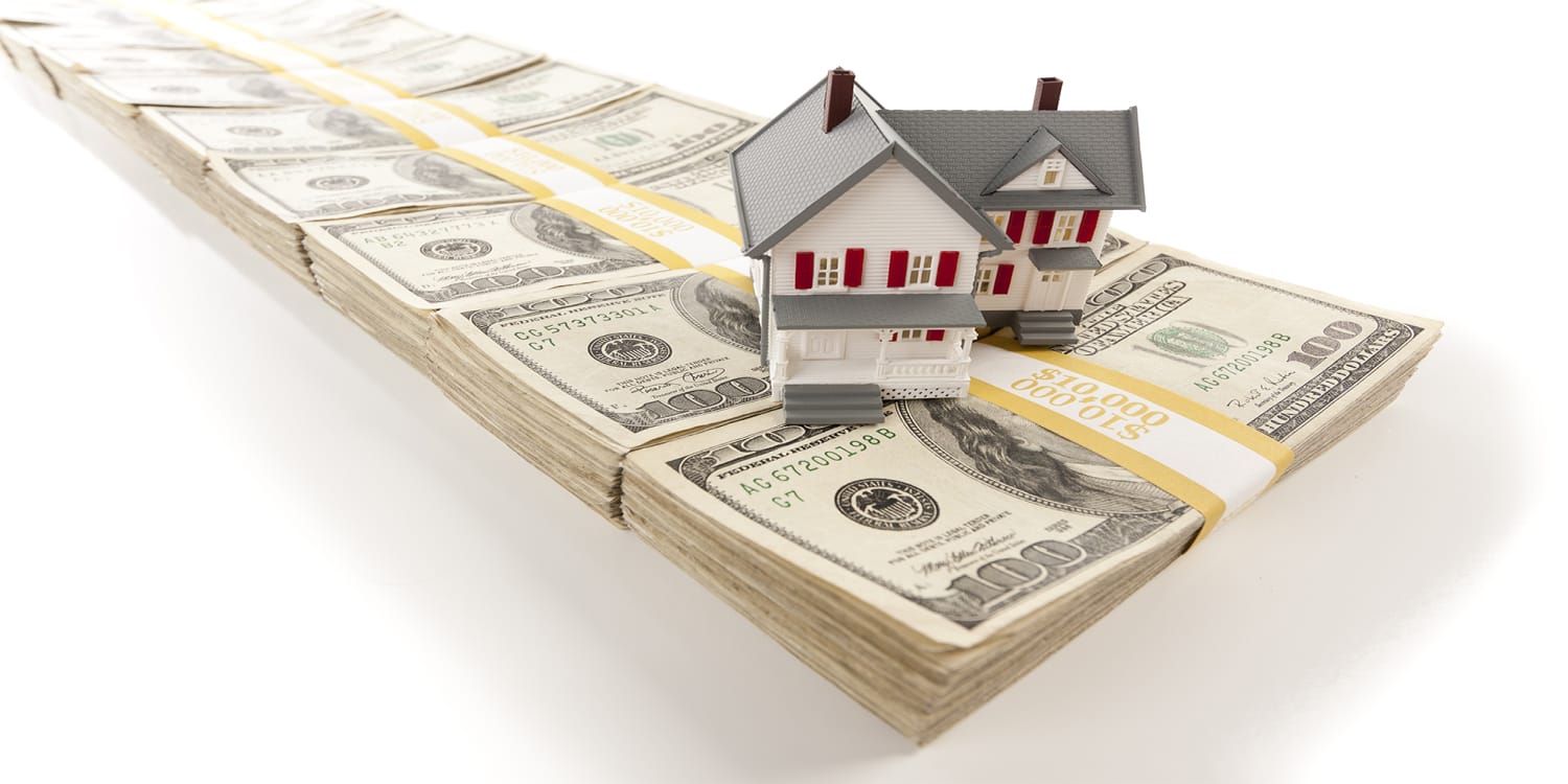 Cash home sale - house on top of money